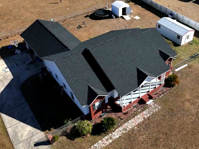 Aerial view of the completed farmhouse roof