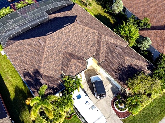 Aerial of the finished multi-slope weatherwood roof