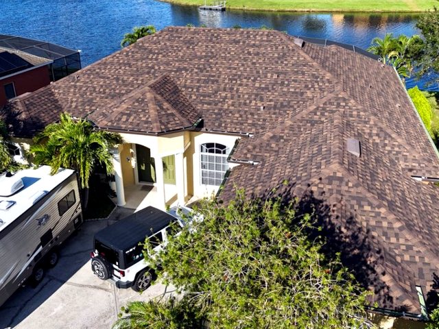 Completed weatherwood roof beside the water