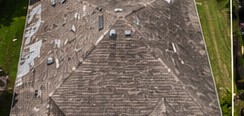 Storm-damaged asphalt shingle roof replaced in Orlando before